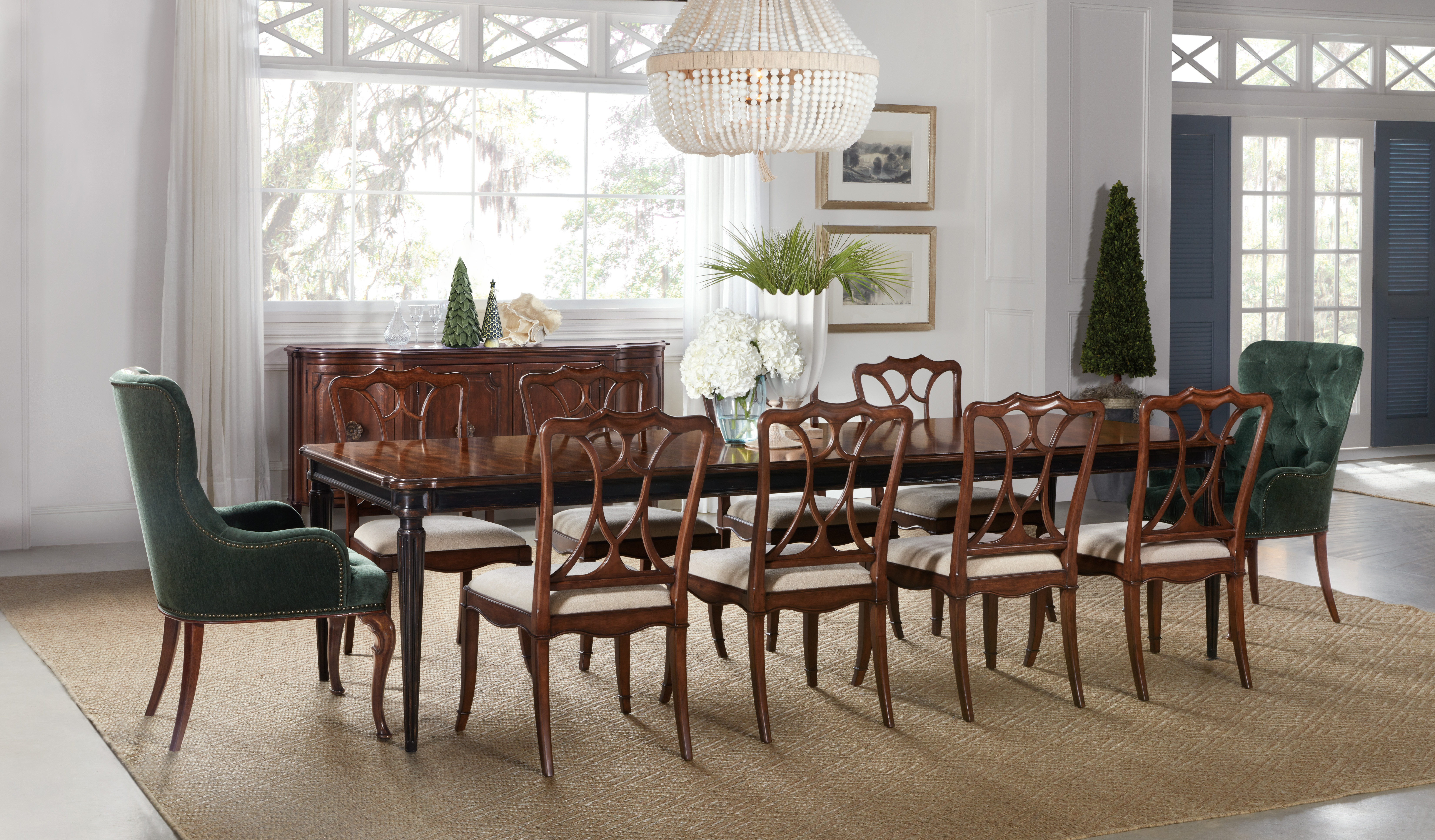 dining room table and chairs with christmas accessories